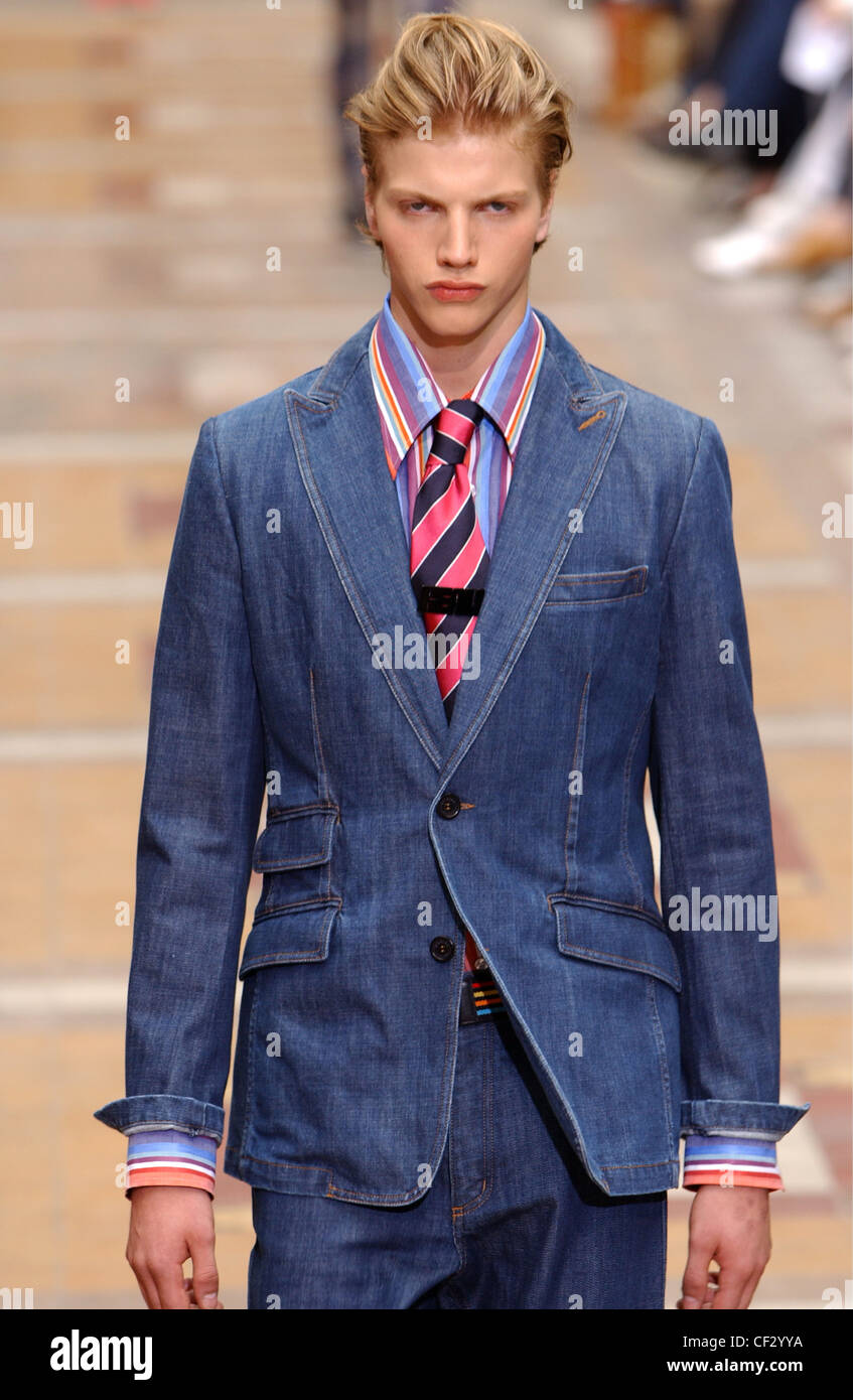 Sonia Rykiel Paris Menswear S S Male model wearing blue jeans suit with  striped shirt and striped tie Stock Photo - Alamy
