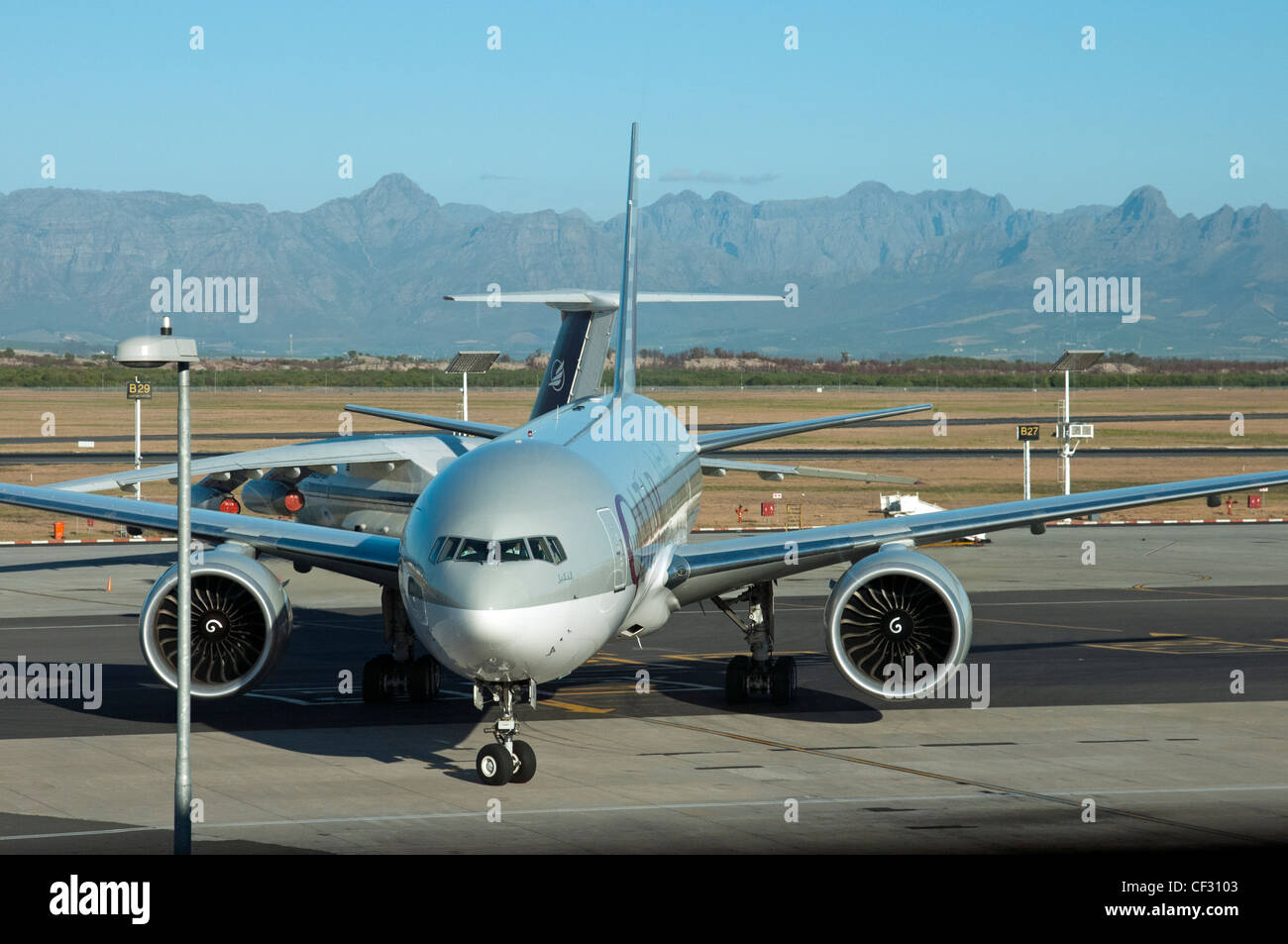 Qatar Airlines Boeing 777 200 on the taxiway at Cape Town International Airport Stock Photo