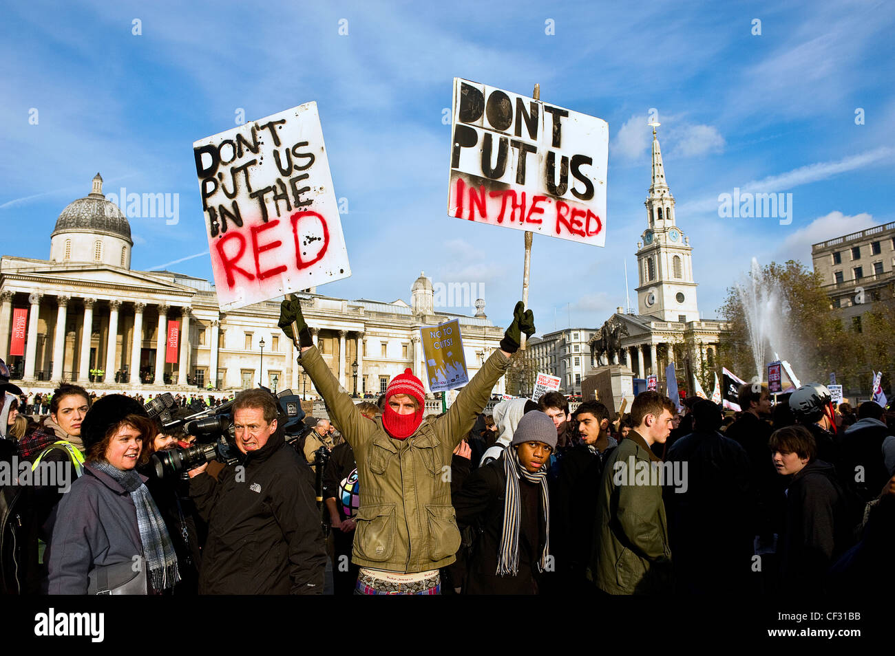 Students demonstrating against education cuts in Trafalgar Square. Stock Photo