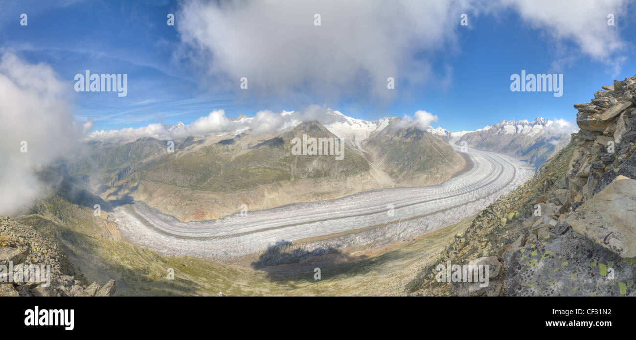 concept for hiking, climbing, walkig and outdoor adventures: panorama view above long Aletsch glacier Switzerland Stock Photo