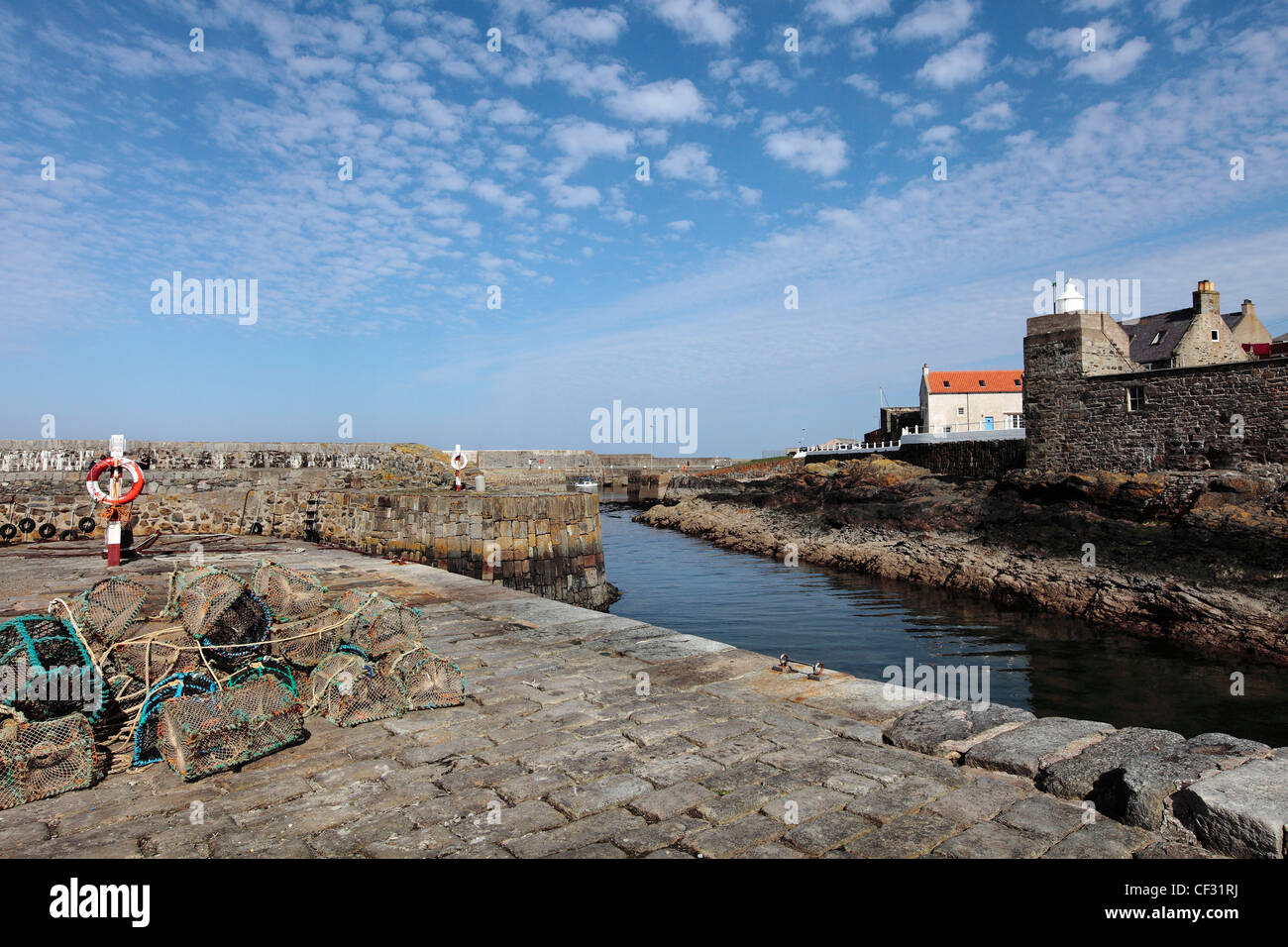 Portsoy Harbour, completed in 1693 is possibly the oldest natural harbour in Europe. Stock Photo