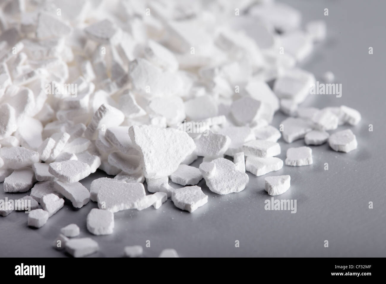 Calcium chloride flakes. Stock Photo
