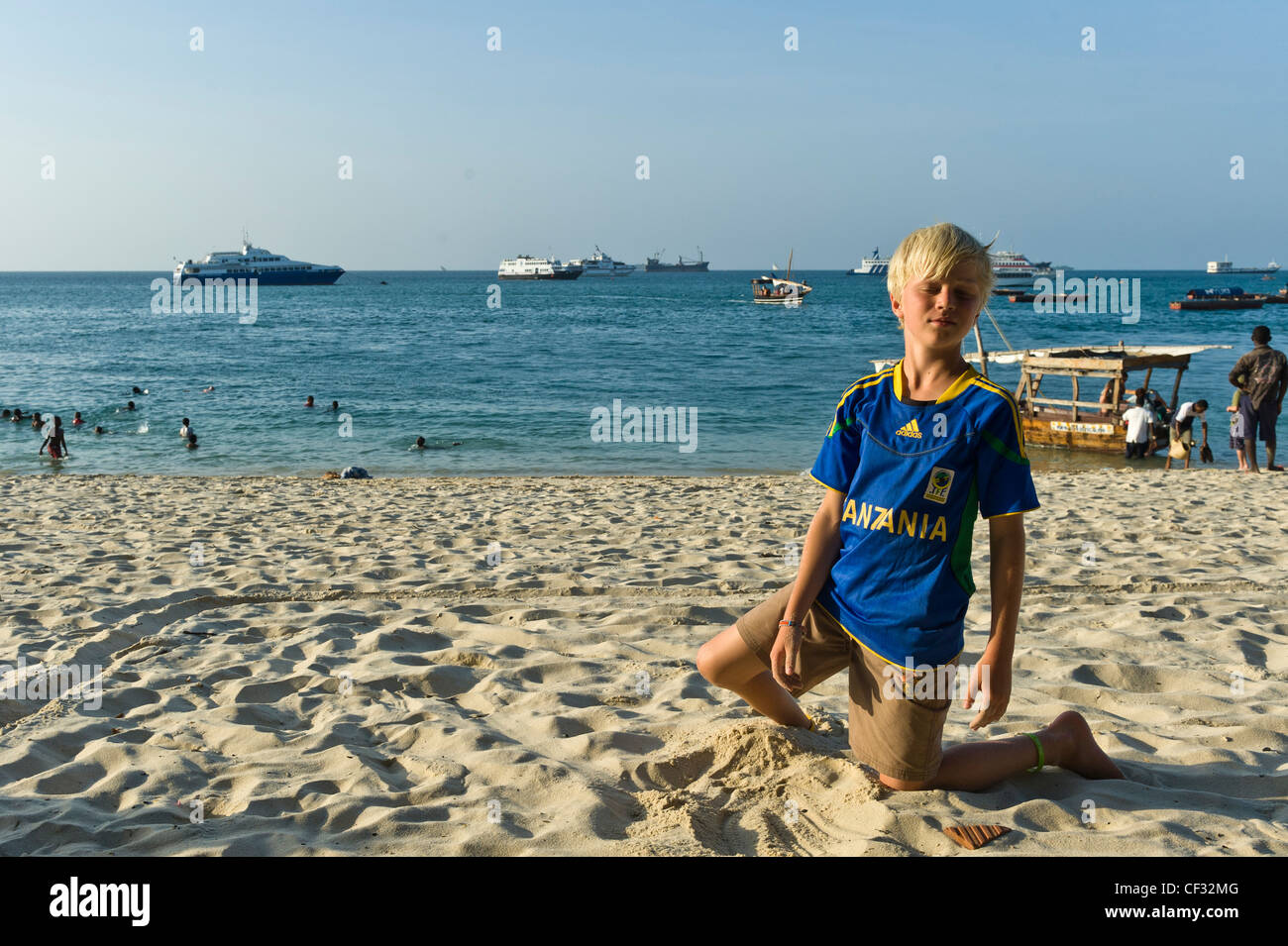 Boy Plays On The Beach At Tembo Hotel Stone Town Zanzibar