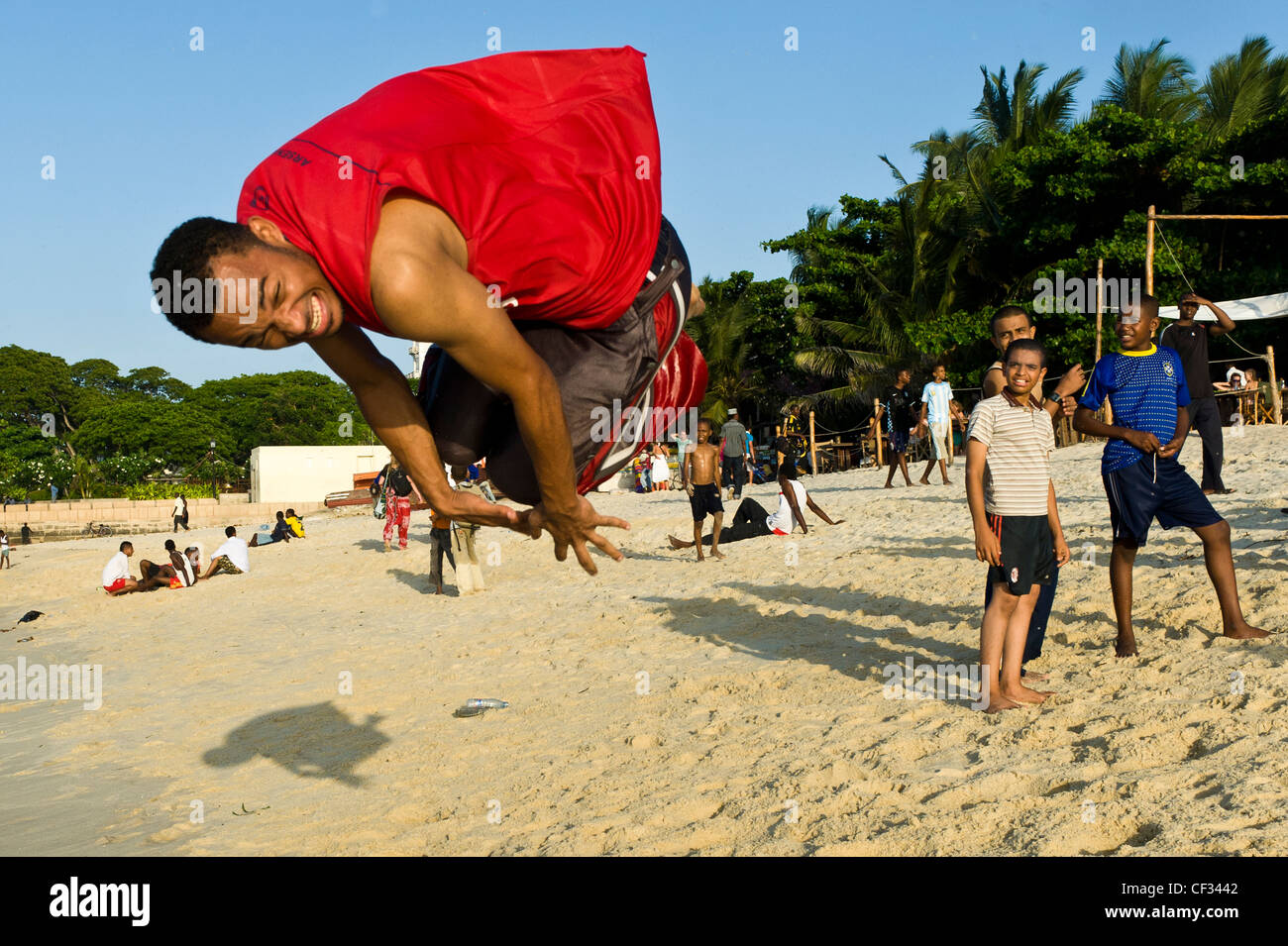 Acrobats training on the beach Stone Town Zanzibar Tanzania Stock Photo