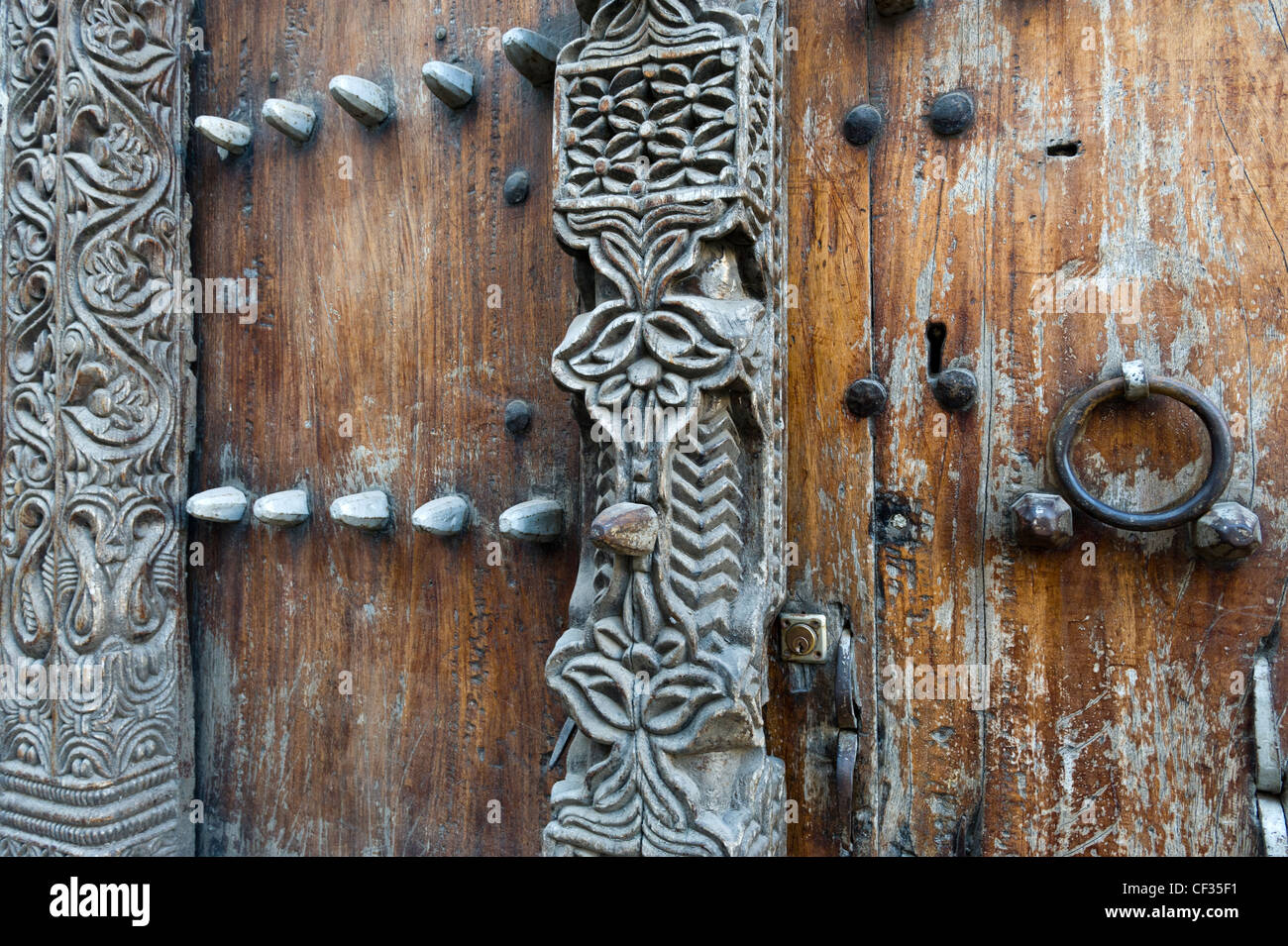 Carved wooden doors of stone town Stock Photo - Alamy