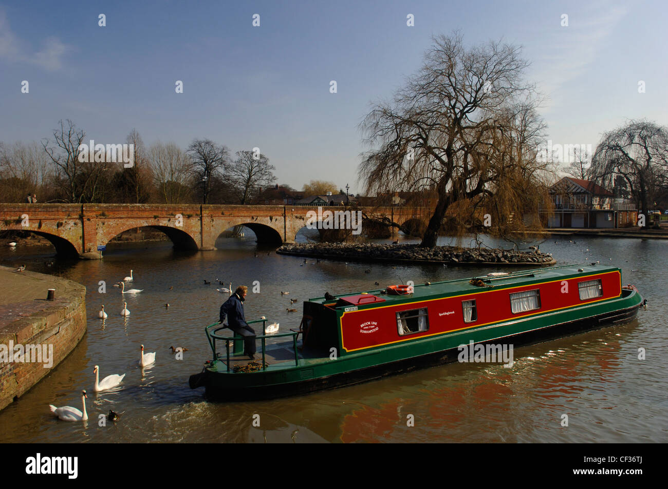 Man steering a narrowboat hi-res stock photography and images - Alamy
