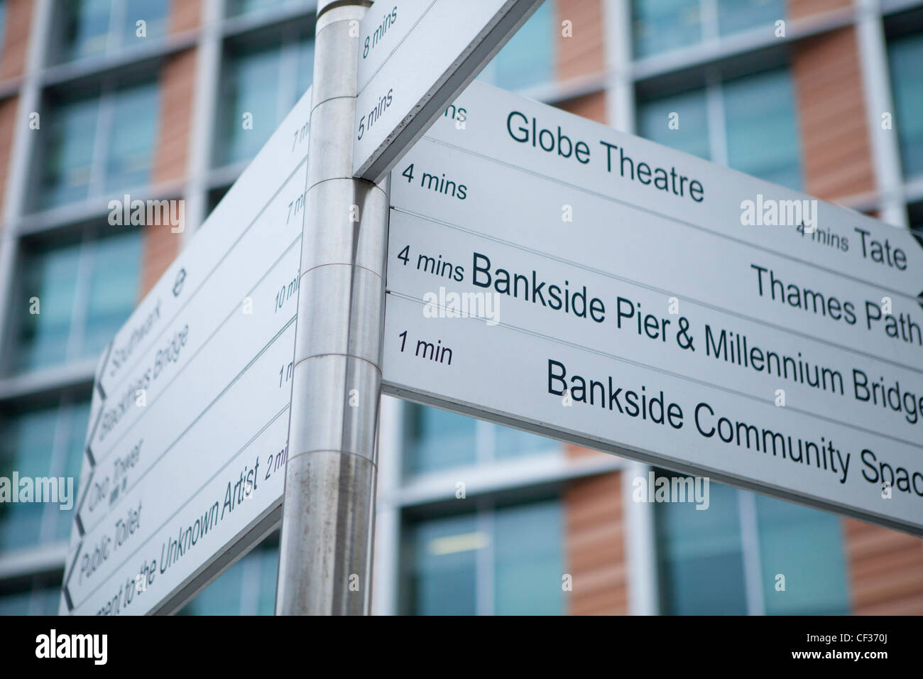 A view of a sign post outside the Blue Fin Building in Sumner Street in the London Borough of Southwark Stock Photo