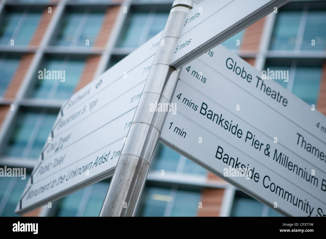 A view of a sign post outside the Blue Fin Building in Sumner Street in the London Borough of Southwark Stock Photo