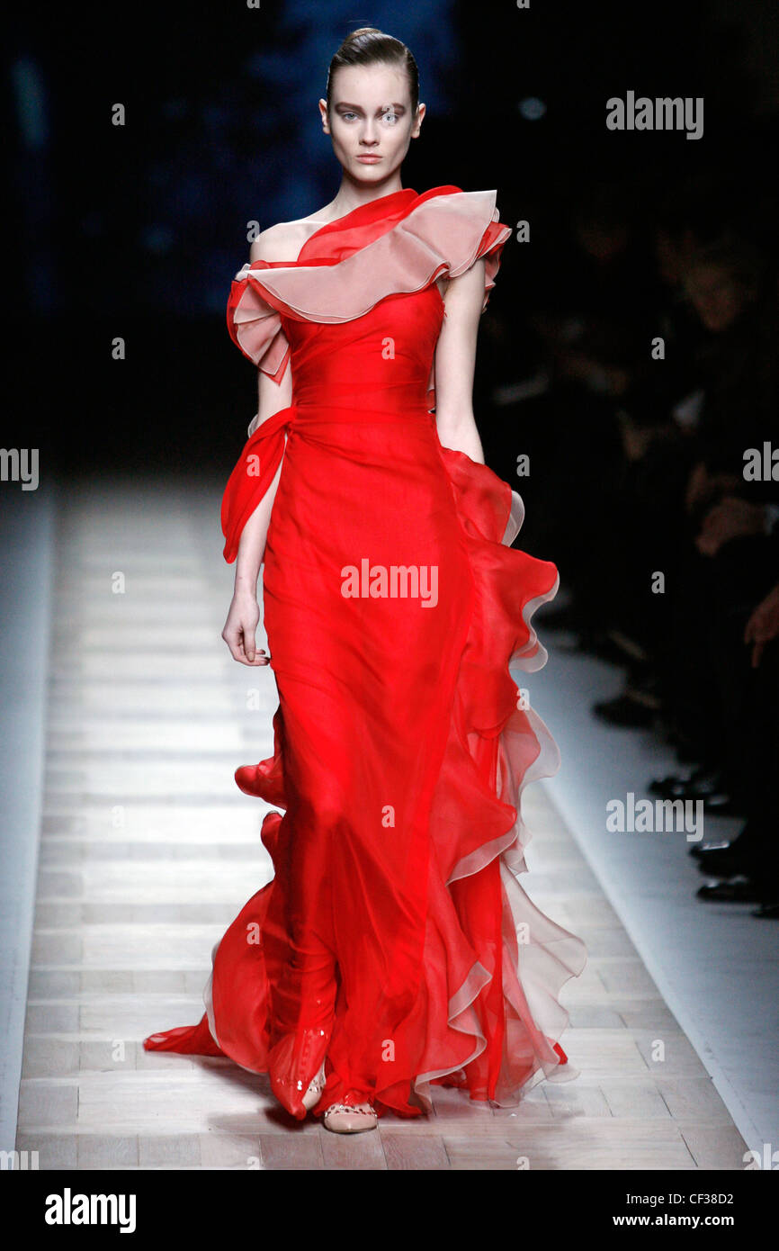 Valentino Paris Ready to Wear Autumn Winter Two tone red and peach frilly  chiffon off the shoulder gown Stock Photo - Alamy