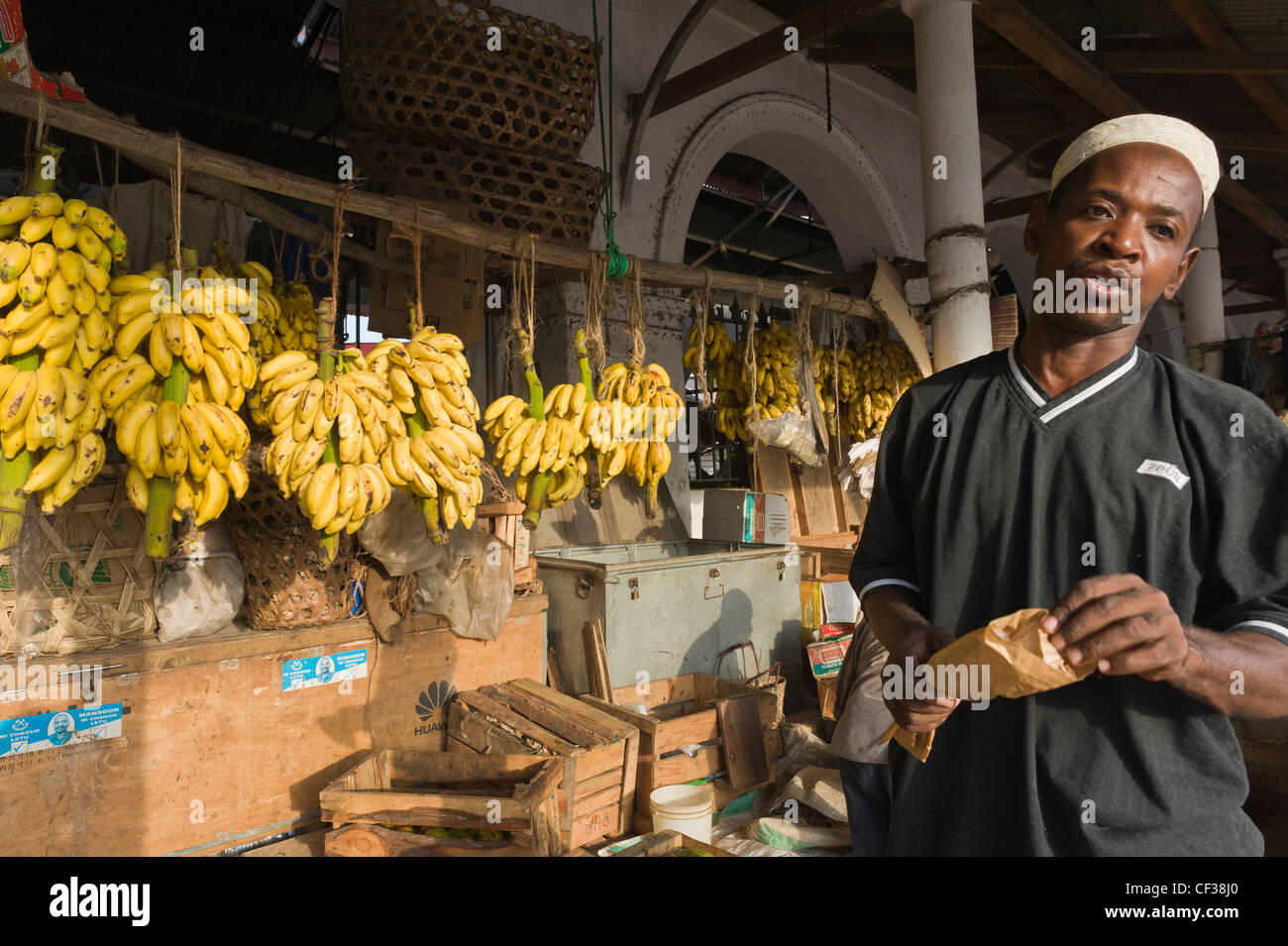 Man selling bananas Stone Town Zanzibar Tanzania Stock Photo