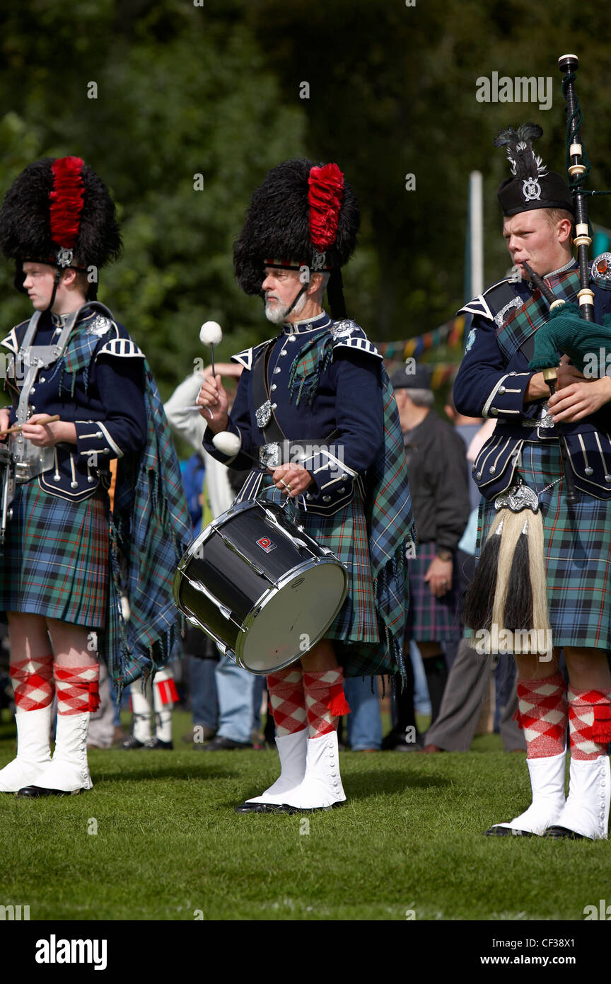 A marching band performing at the Lonach Highland Games Stock Photo Alamy