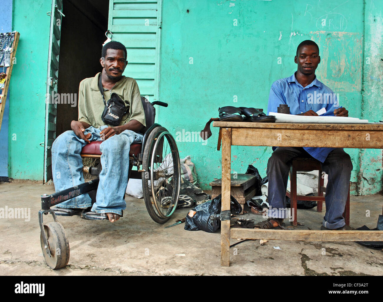 Men with polio in Makeni, Sierra Leone Stock Photo