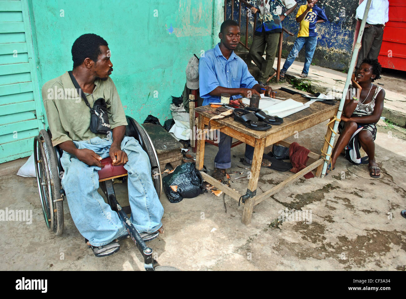 Men with polio in Makeni, Sierra Leone Stock Photo