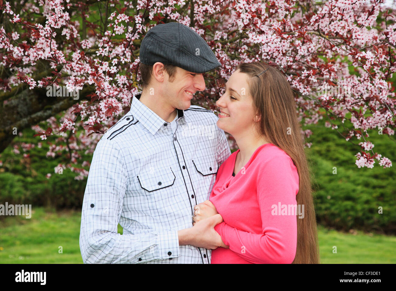 Portrait Of Couple In Park In Spring; Portland Oregon Stock Photo