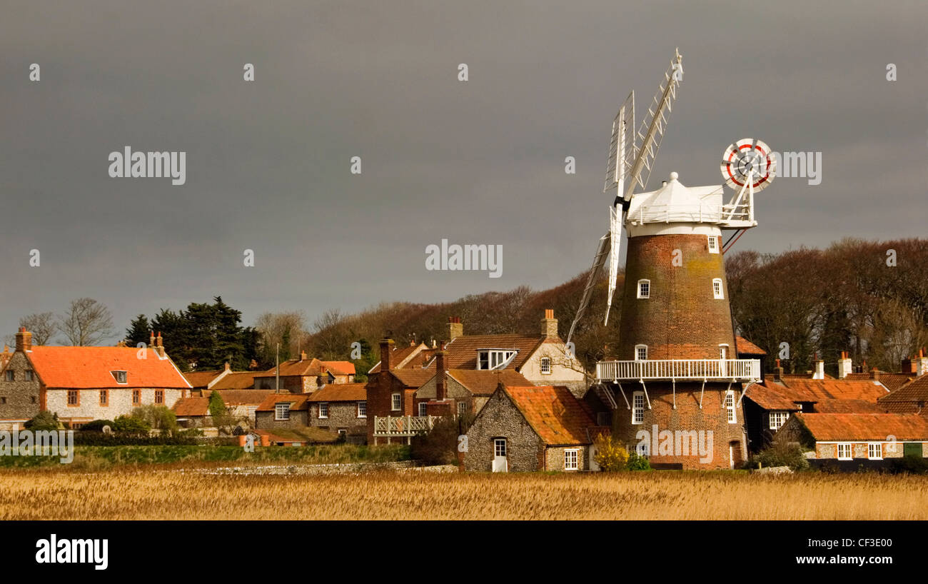 A view of Cley windmill in Blakeney village. Sarah Maria Wilson bought the mill in 1921, she had the machinery removed and the s Stock Photo