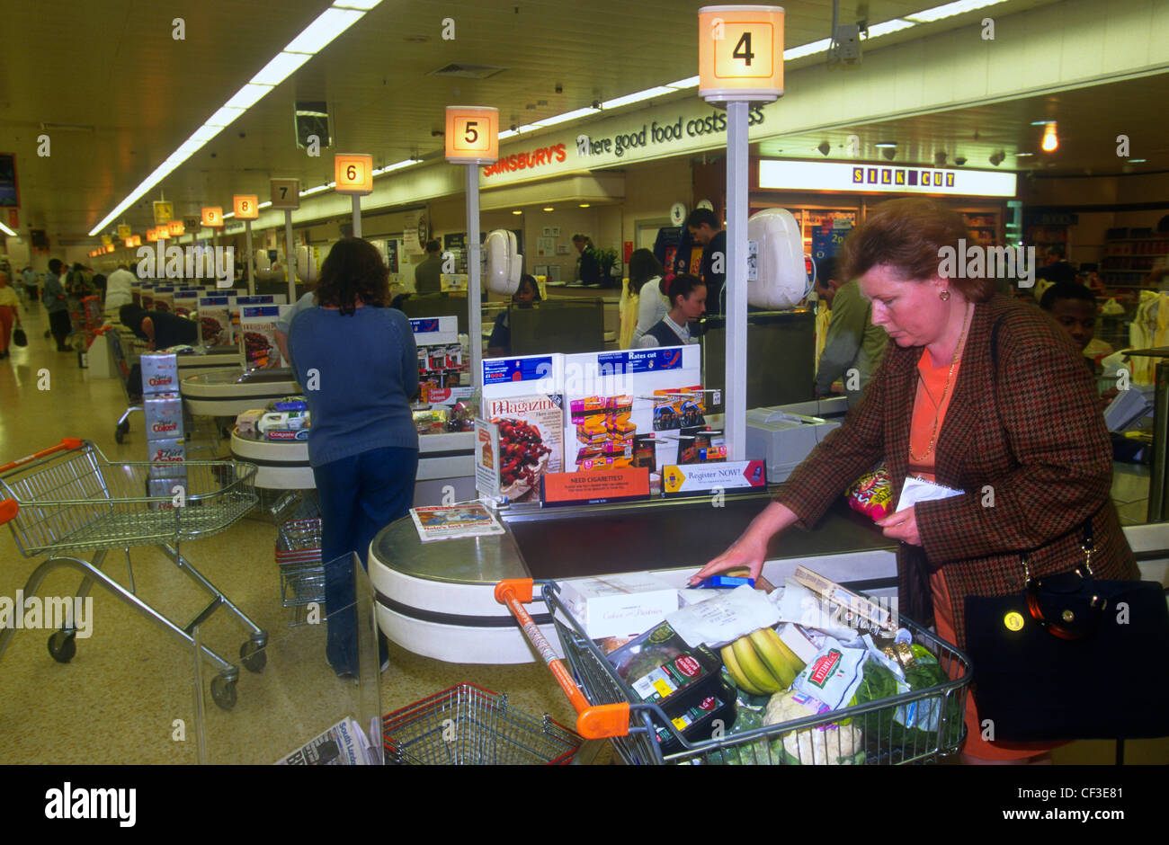 Checkout counters, Sainsbury's supermarket, south London, UK Stock