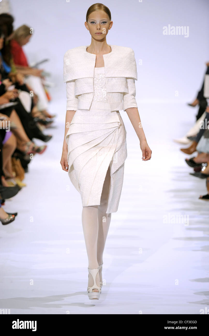 Elie Saab Paris Haute Couture Autumn Winter Model wearing an asymmetric ...