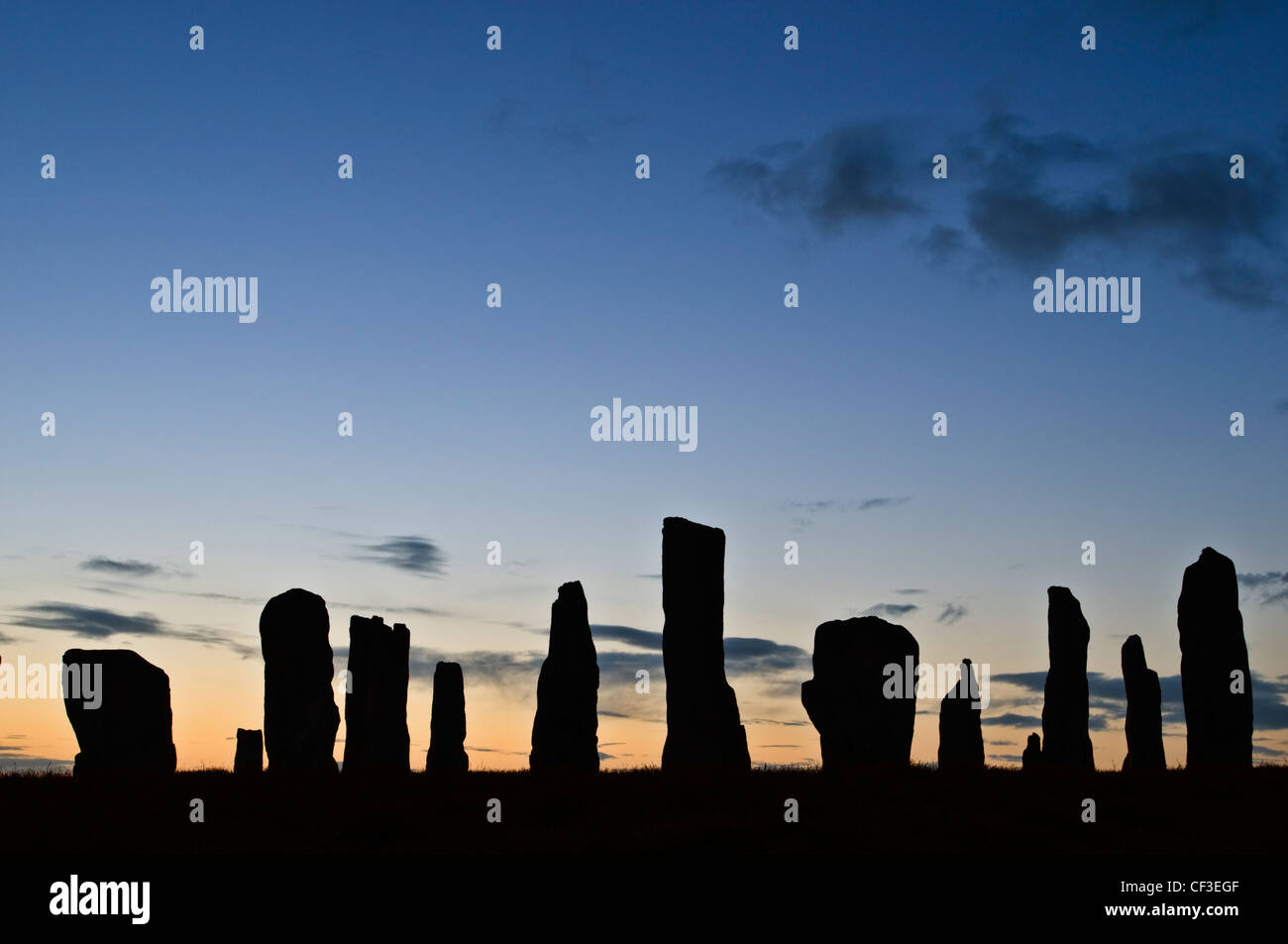 A silhouette of the ancient standing stones of Callanish 1 in the Isle of Lewis. Stock Photo