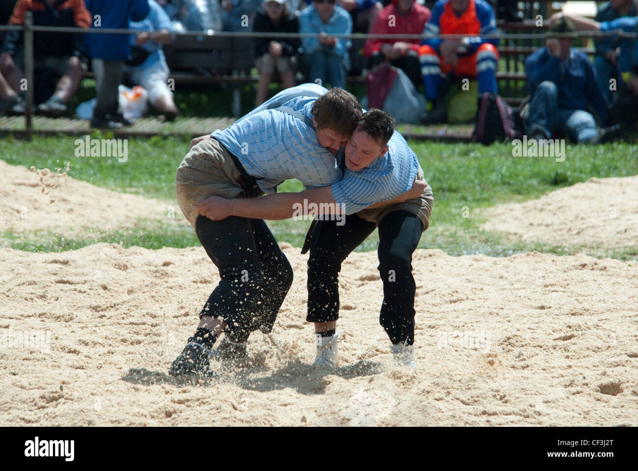 Swiss stile Wrestling "Schwingen" with 2010 Champion Kilian Wenger (r), Berner Oberlaendisches Schwingest 2011, Reichenbach Stock Photo