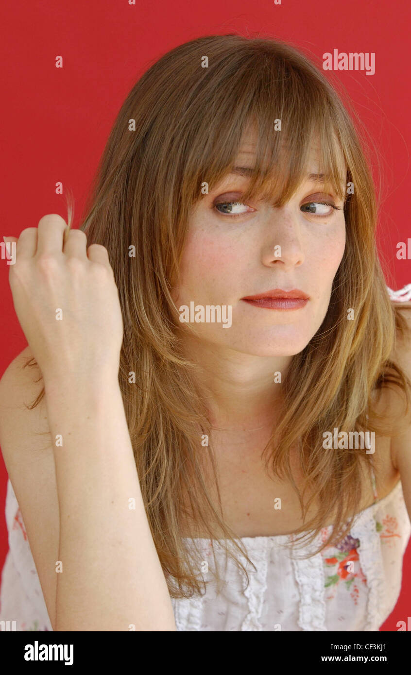 Female Long Light Brown Hair And Fringe Wearing Subtle Eye Make Up