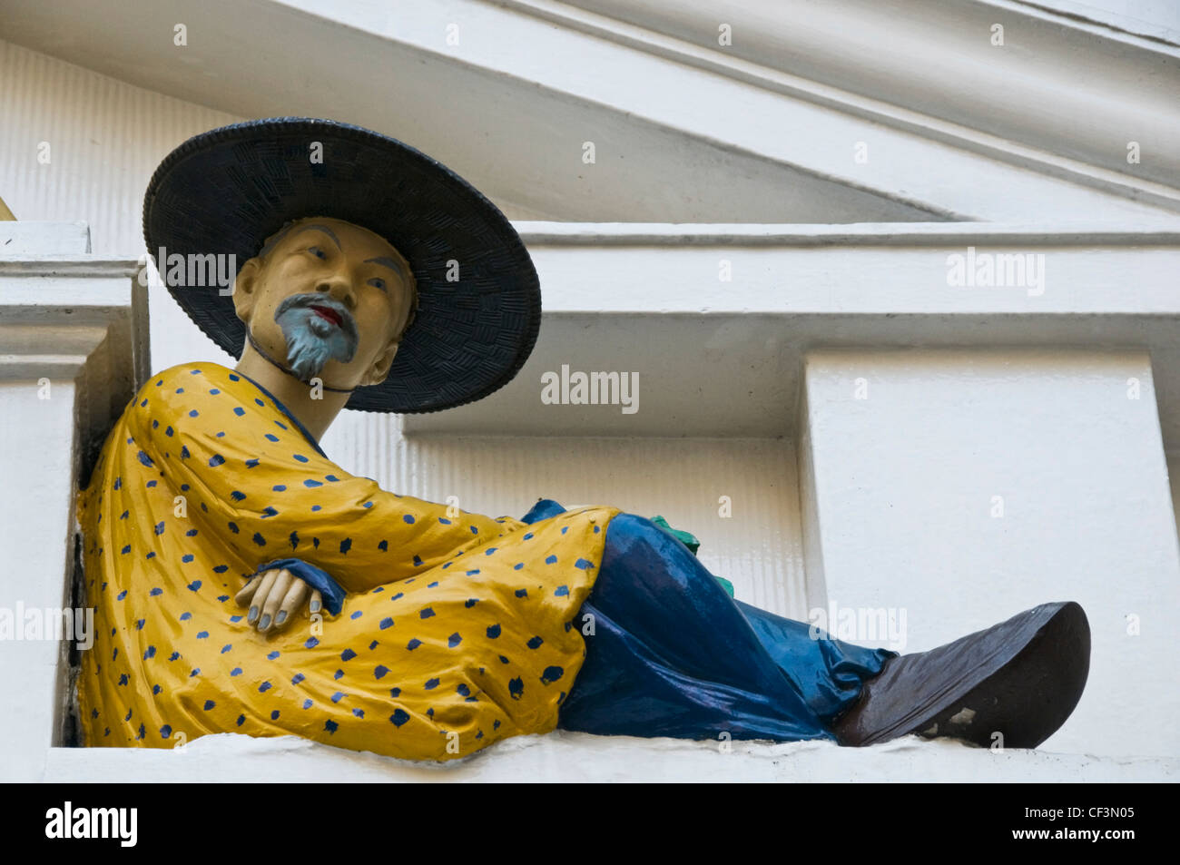 An Asian figure above the doorway to Twinings teashop, still at its original location on the Strand since it was first opened as Stock Photo