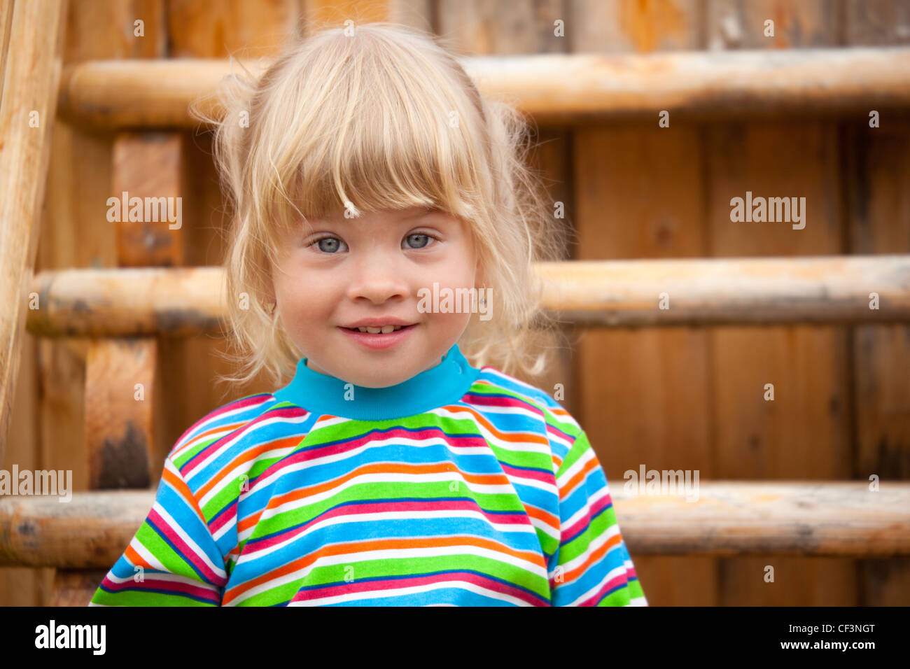 Portrait of the girl on a playground Stock Photo - Alamy