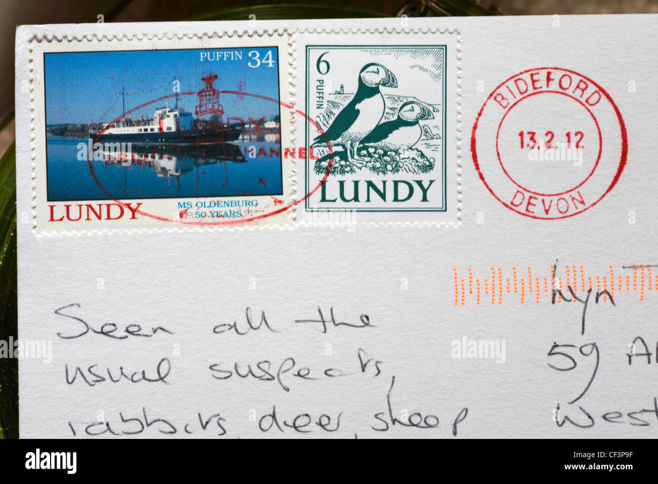 Lundy stamps stuck on back of postcard with Bideford Devon stamp Stock Photo