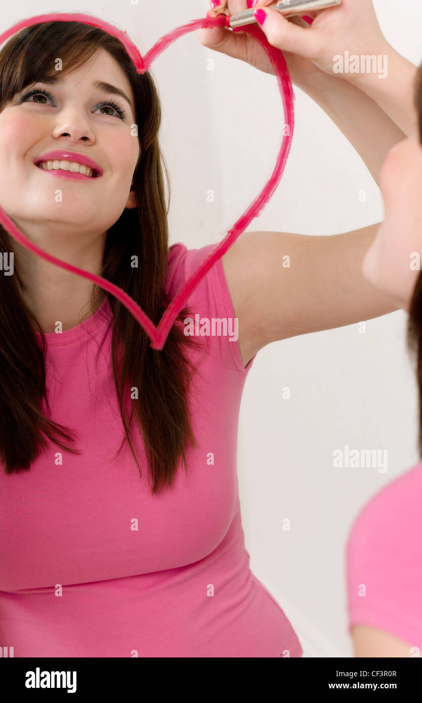 Reflection Of Female Long Brunette Hair Blue Eyeshadow And Pink
