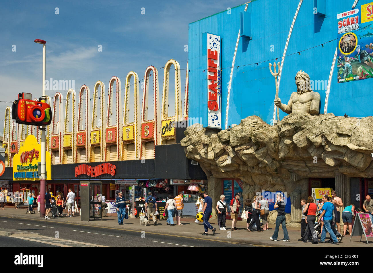 An amusement arcade and the Sealife Centre along Blackpool's Golden Mile. Stock Photo