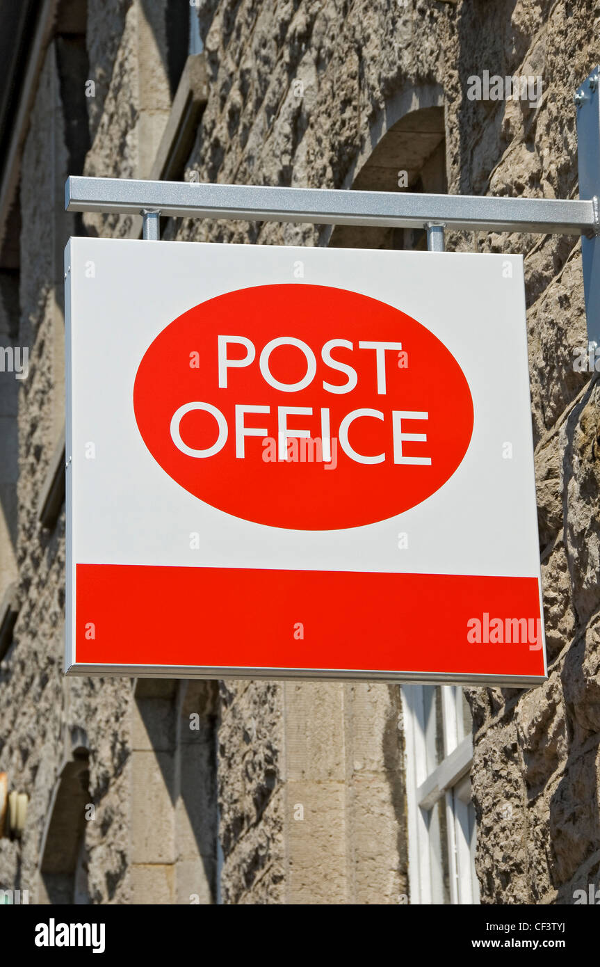 Sign hanging on wall outside GrangeoverSands post office Stock Photo