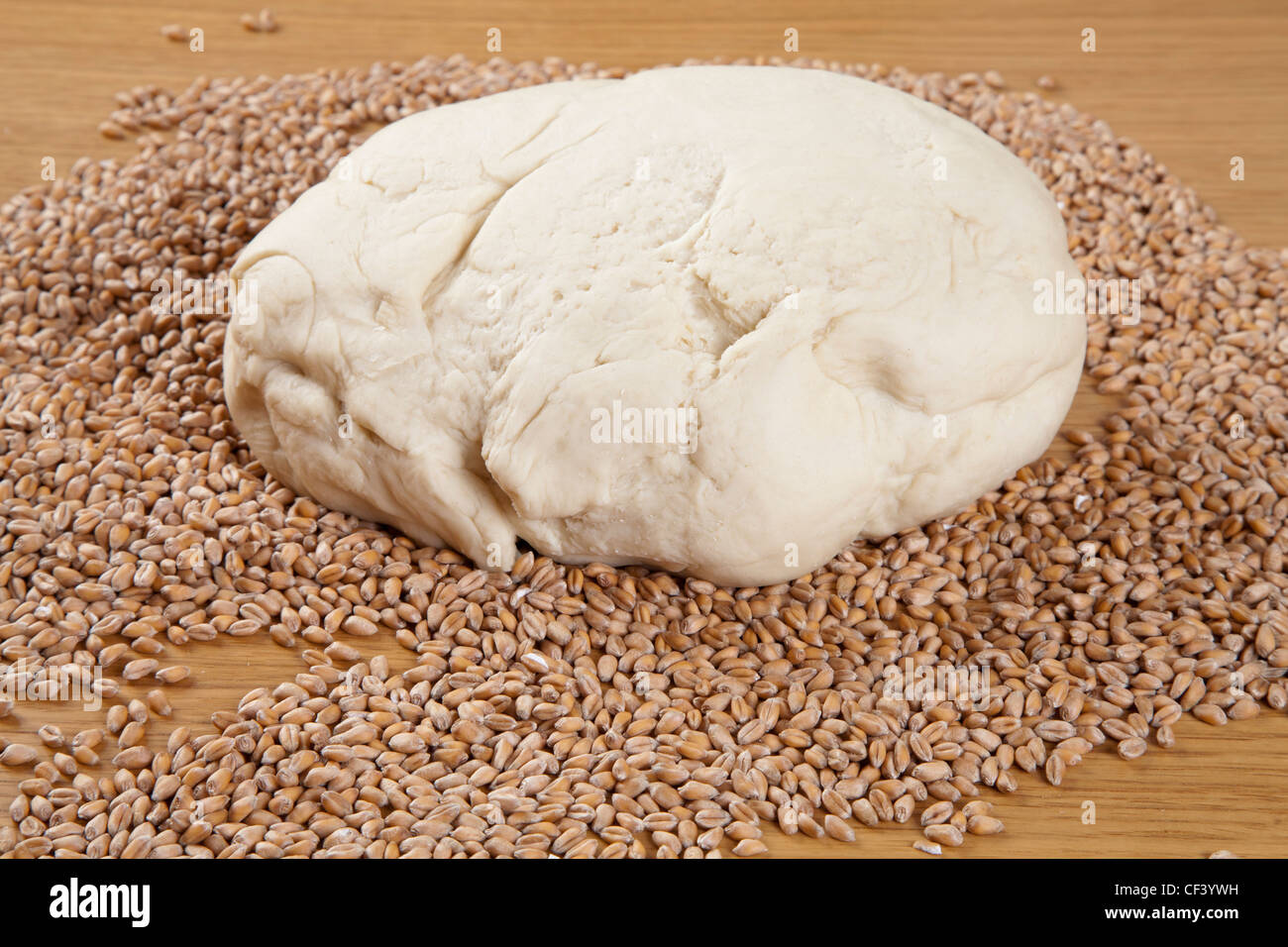 Dough of lump and wheat grains Stock Photo Alamy