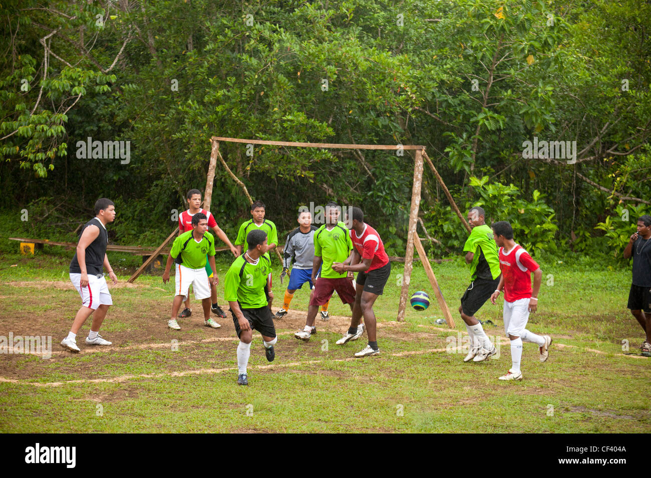 young man playing soccer, Isla Colon, Bocas del Toro, Panama, Central America Stock Photo