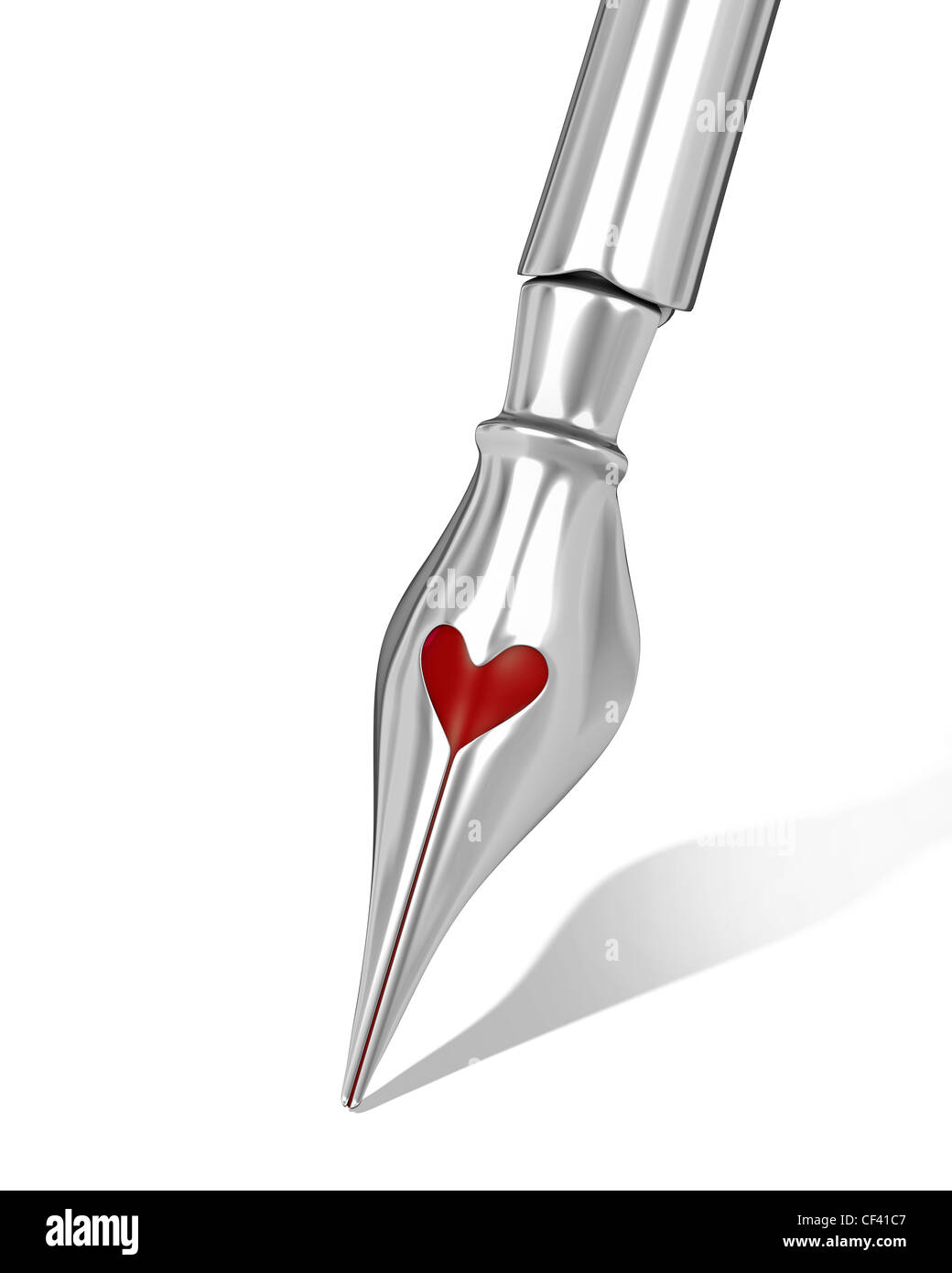 Metal ink pen nib with a heart shaped hole isolated on white background Stock Photo