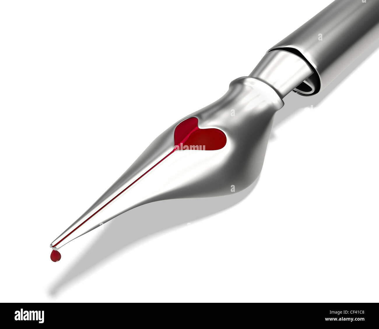 Metal ink pen nib with a heart shaped hole closeup isolated on white background Stock Photo