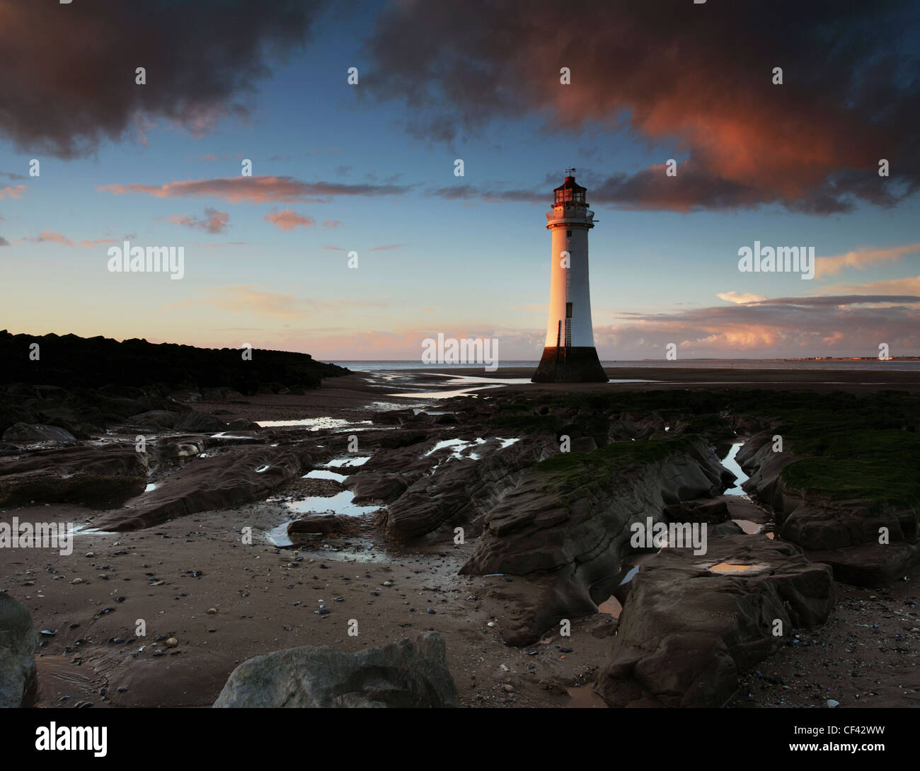 New Brighton lighthouse on the Wirral Peninsula at sunset. Stock Photo