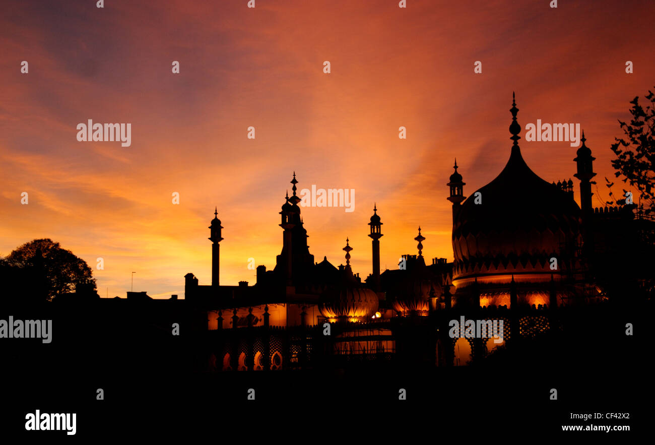 Sunset over The Royal Pavilion. It was built in the 19th Century as a seaside retreat for the then Prince Regent. Stock Photo