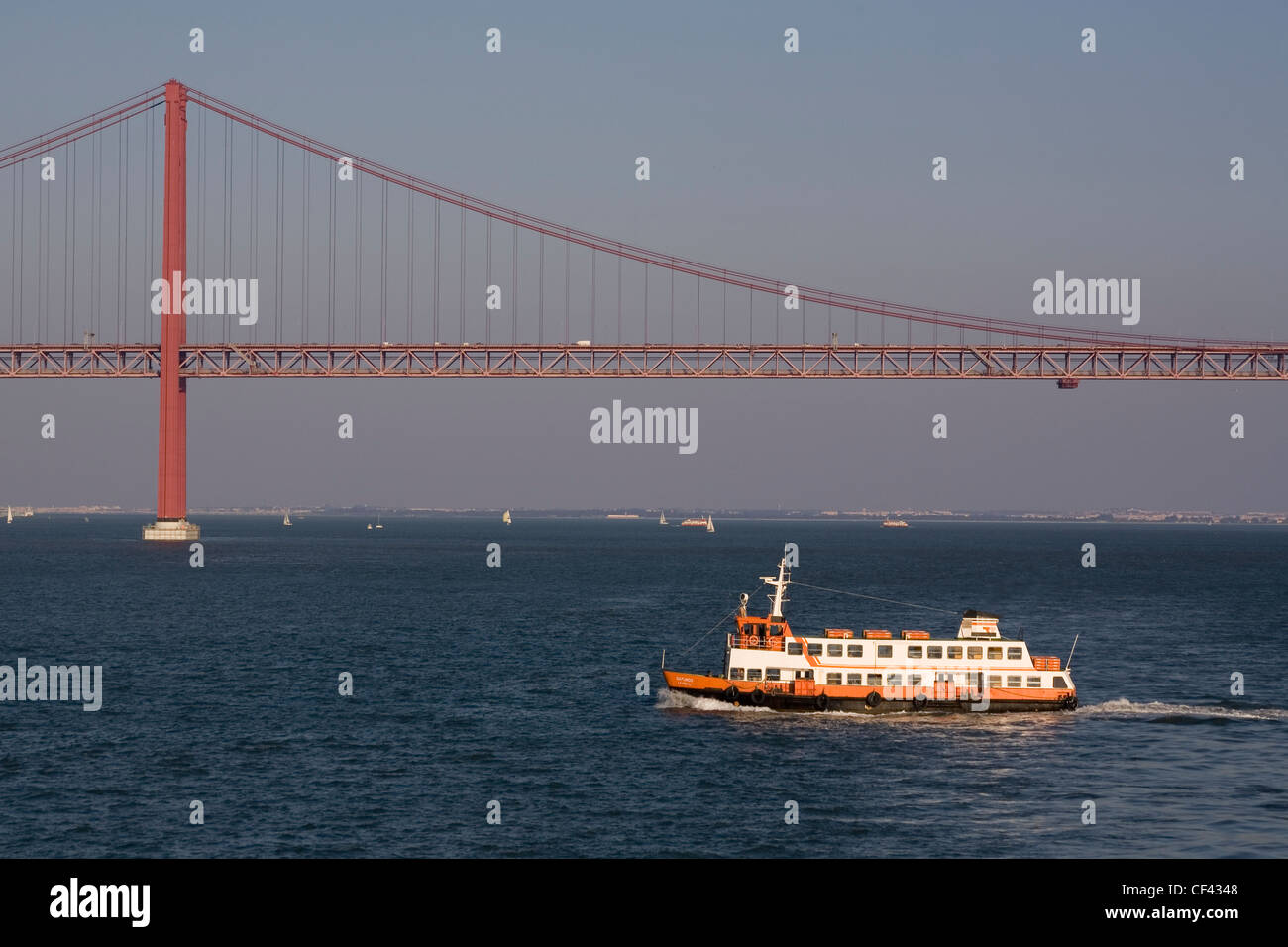 Portugal Lisbon, 25th April bridge & river Tagus ferry Stock Photo Alamy