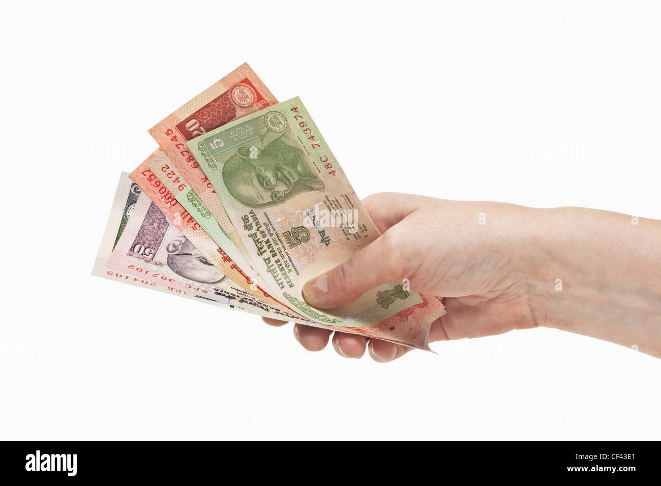 Many Diverse Indian Rupee Bills With The Portrait Of Mahatma Gandhi Are Held In The Hand Background White Stock Photo Alamy