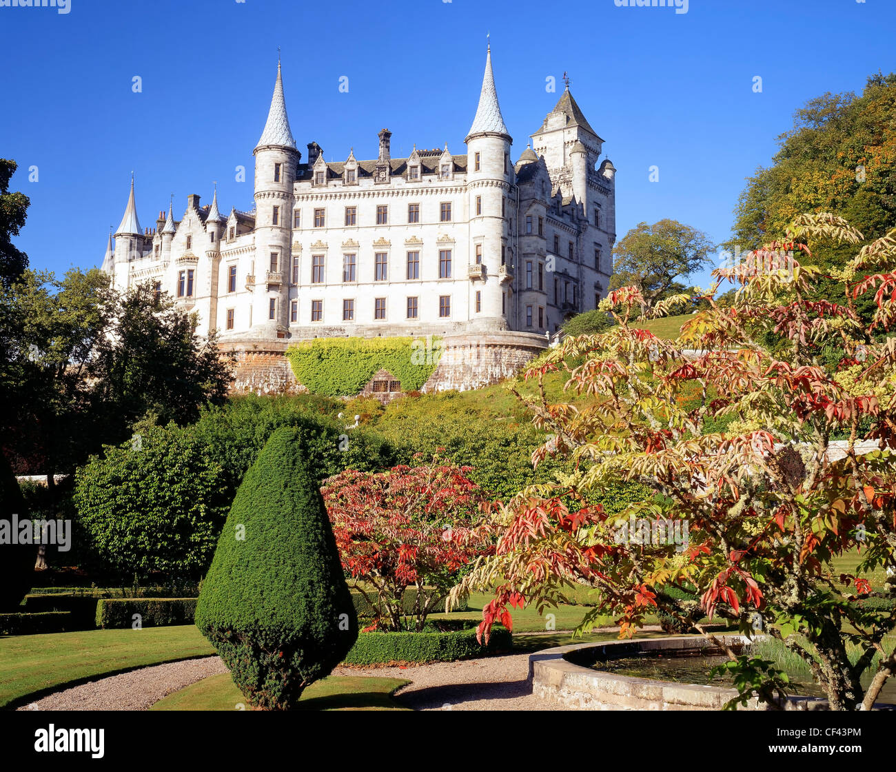 A view across the extensive walled garden of Dunrobin Castle, a stately home in Sutherland. The castle dates back to the middle Stock Photo