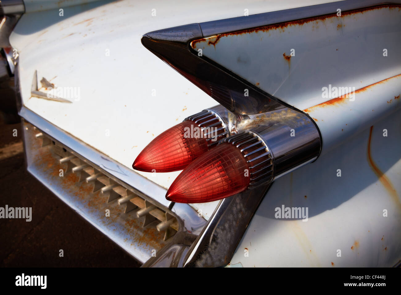 The tail fin and taillights of a 1959 Cadillac Deville. Stock Photo