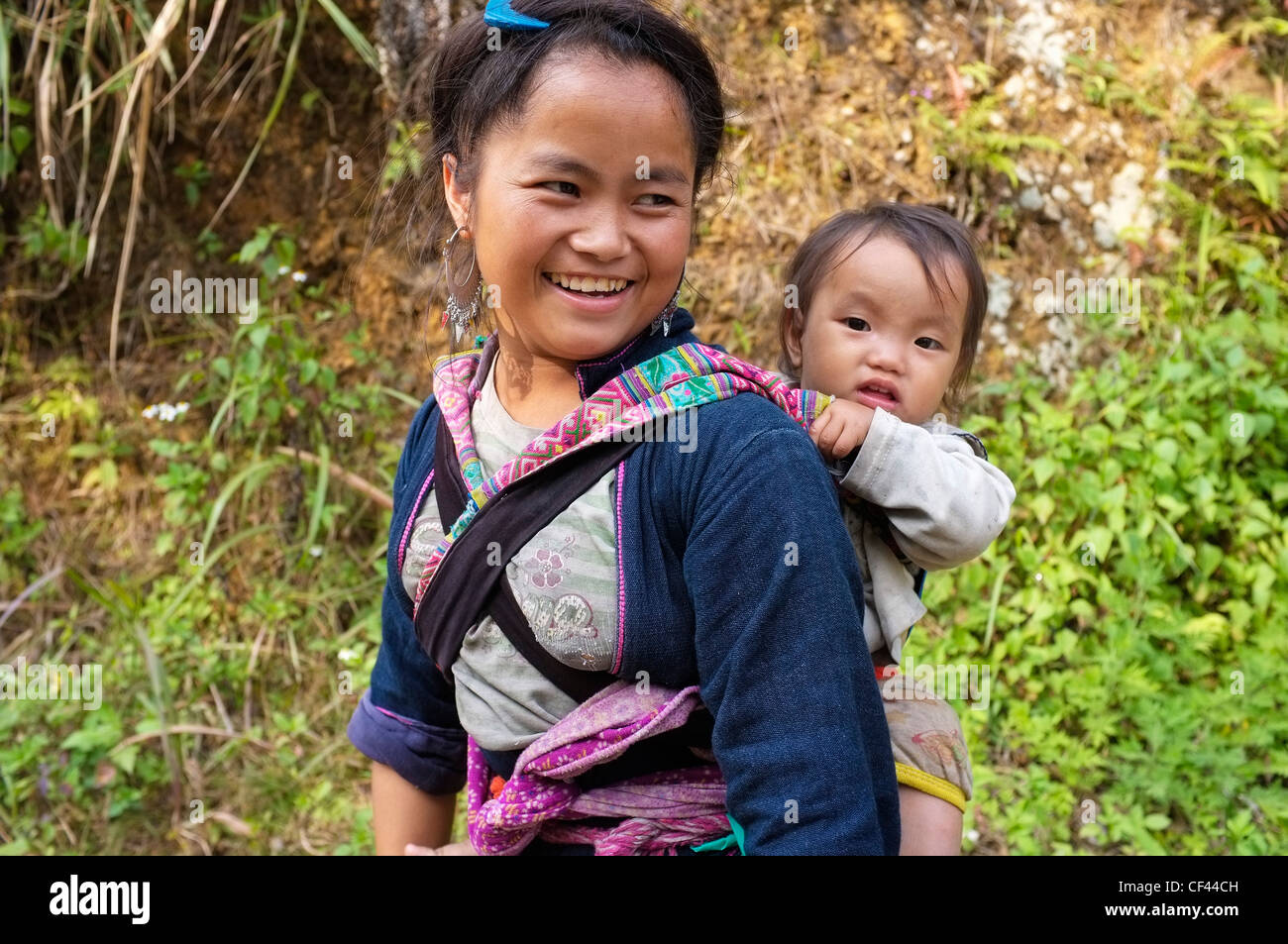 carrying baby on back