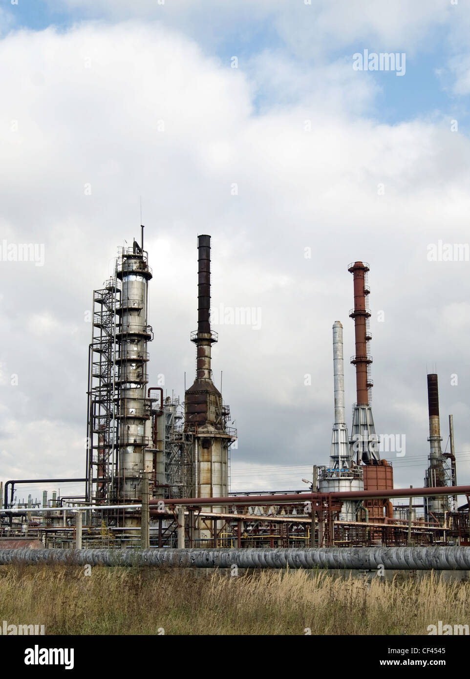 oil refinery against a blue sky Stock Photo