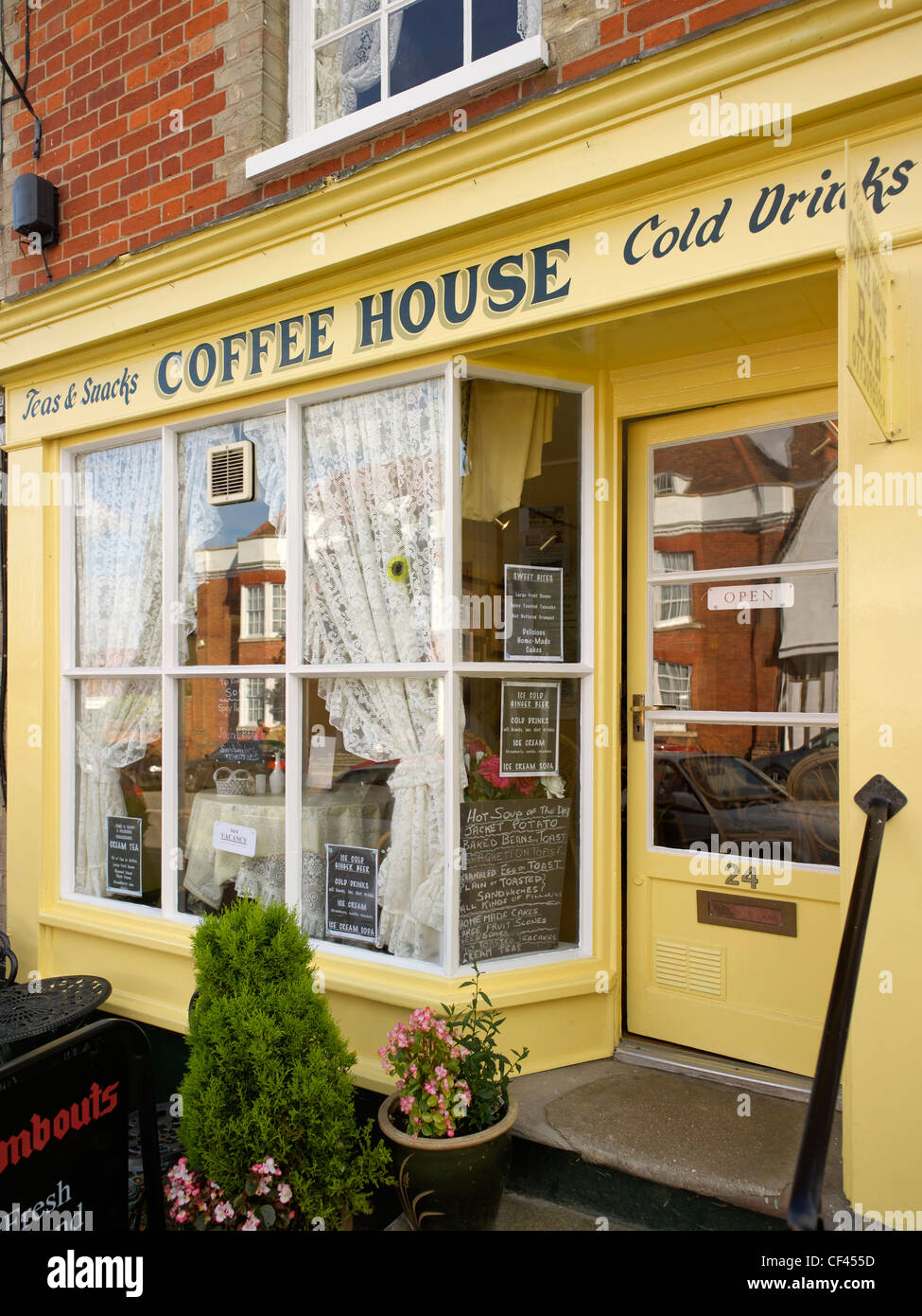 An English village coffee house. Away from the bustle of the cities, coffee houses in rural communities are for locals and touri Stock Photo