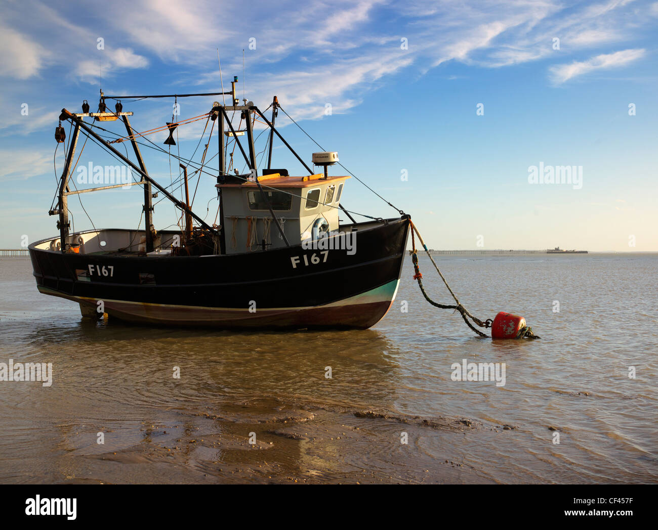 The Hornet at low tide off of Southend beach, with pier in the background. Originally the south end of the village of Prittlewel Stock Photo