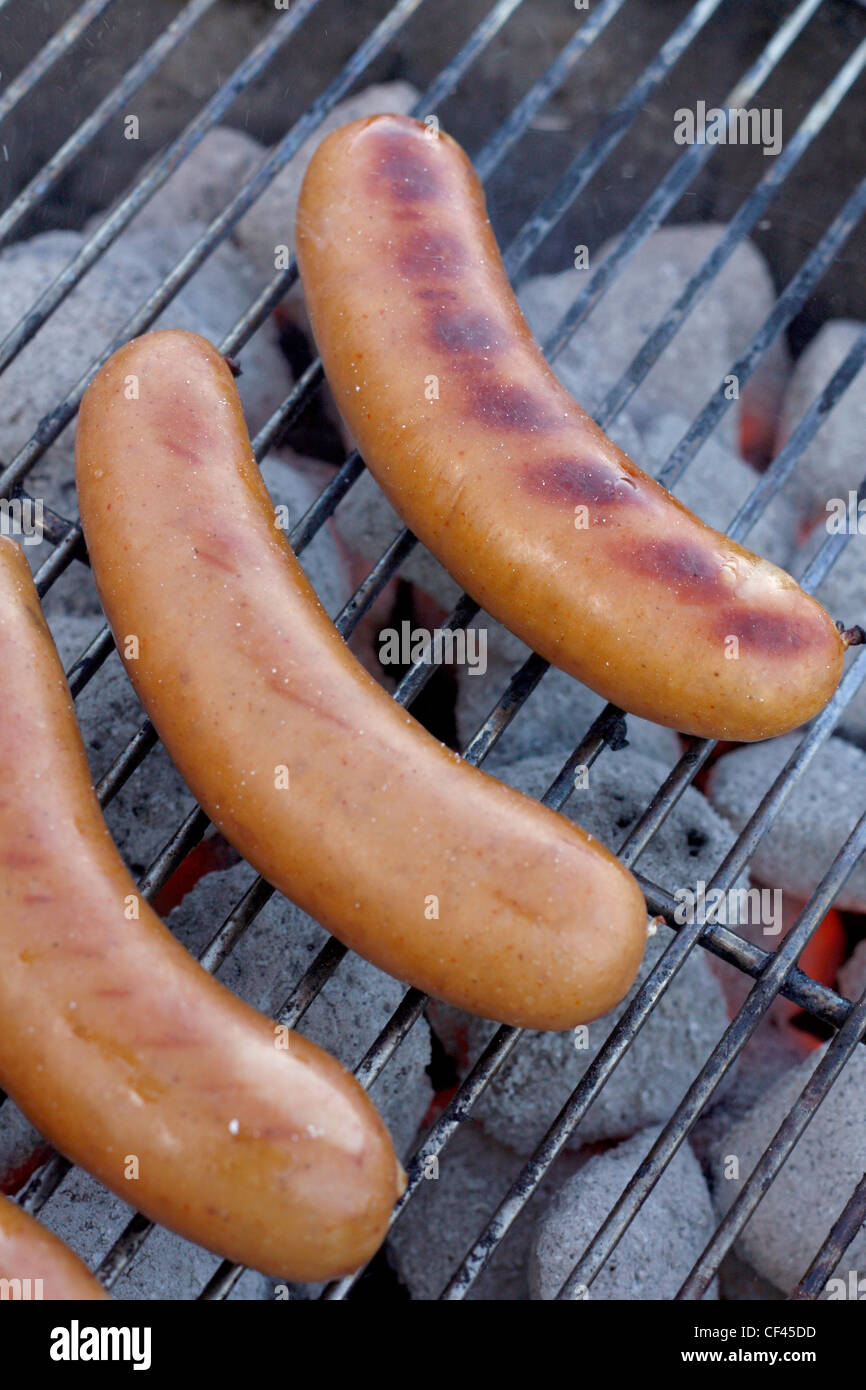 Sausages on a barbecue Stock Photo