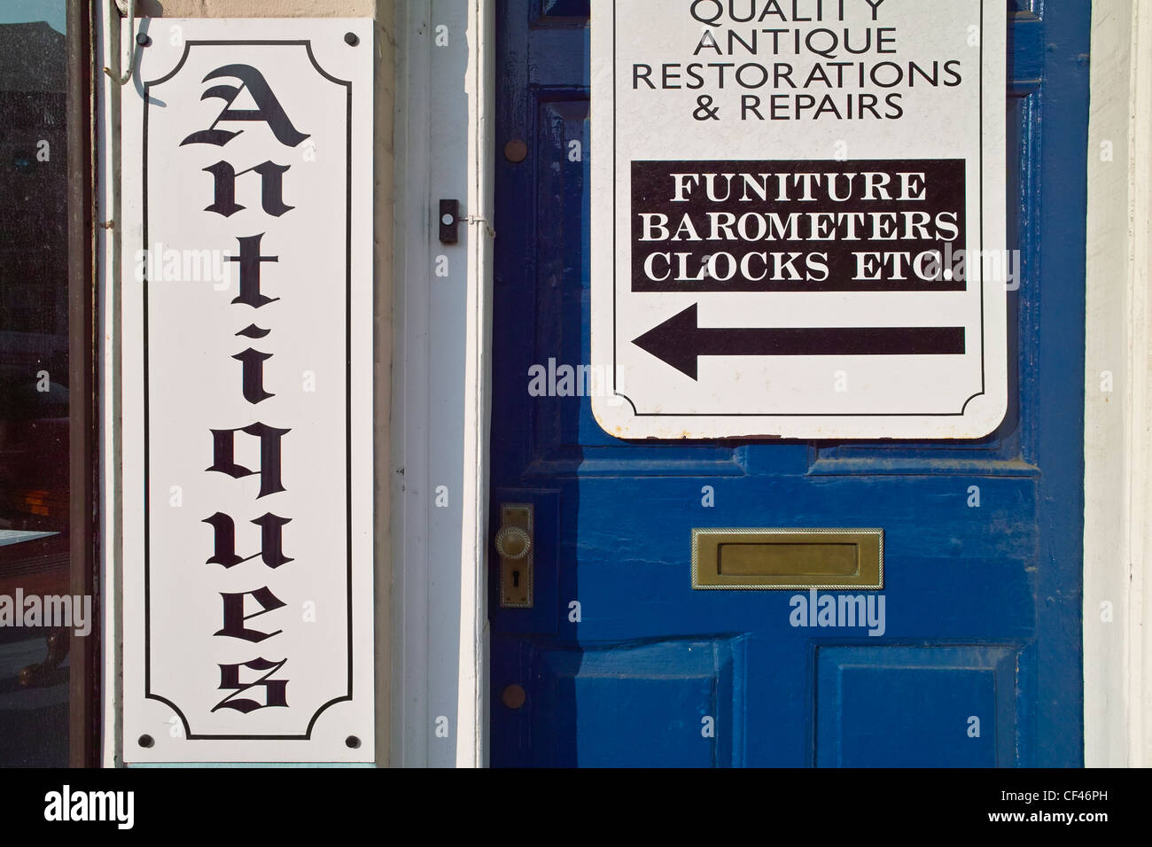 A detailed view of hanging antique signs  in Thaxted village. Stock Photo