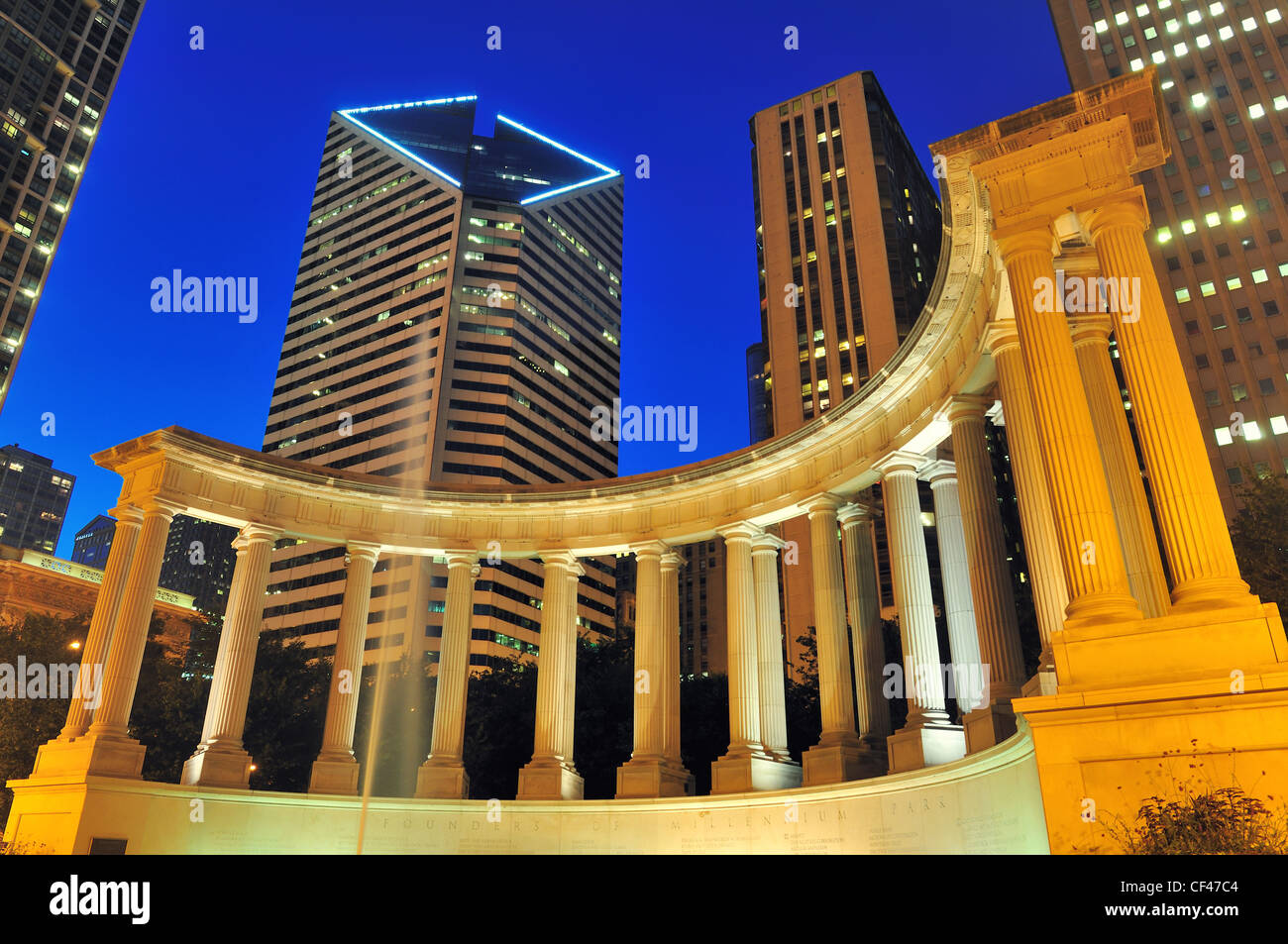 Millennium Monument in Wrigley Square at night a semicircle of paired Greek columns called a peristyle Chicago Illinois, USA. Stock Photo