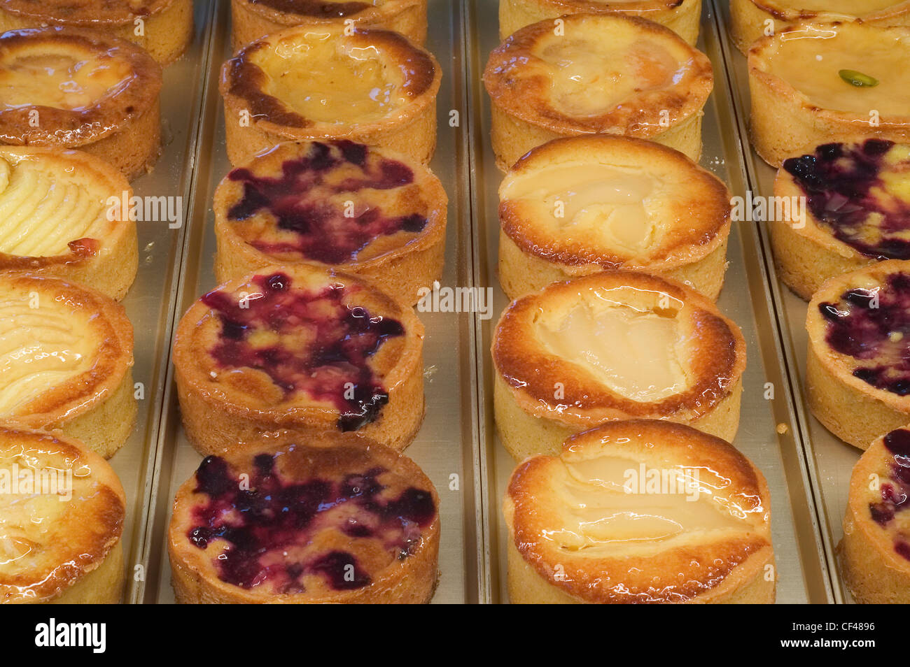 Pastries on display in pastry shop Stock Photo Alamy