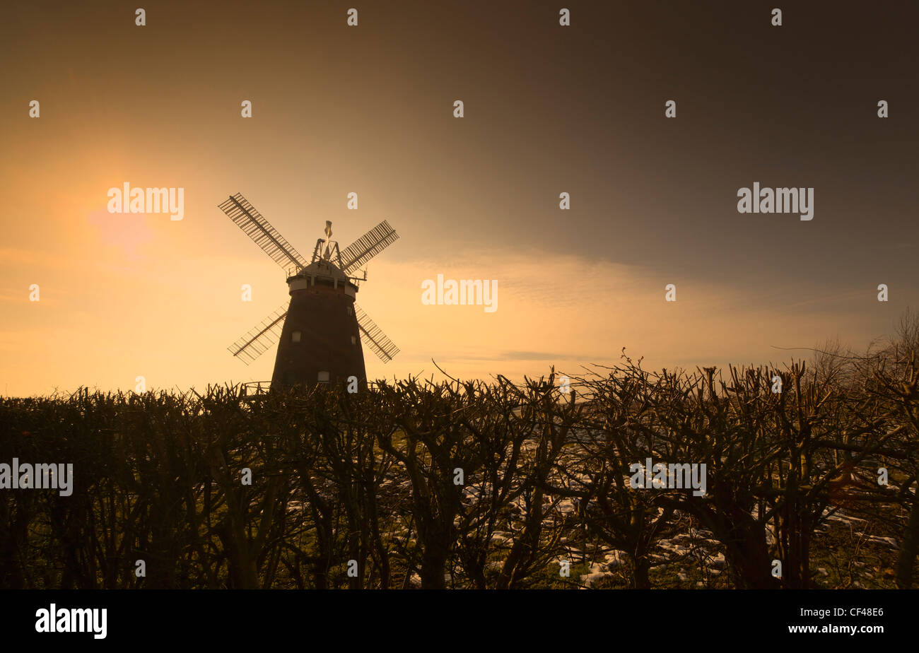 A silhouette of John Webbs Windmill at sunset in Thaxted. Stock Photo