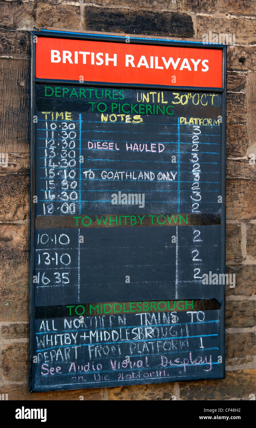 Old fashioned British Railways departures board at Grosmont station on the North Yorkshire Moors Railway. Stock Photo